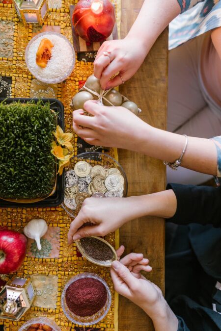 two woman preparing the table for celebration