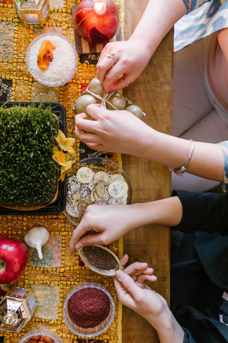 two woman preparing the table for celebration